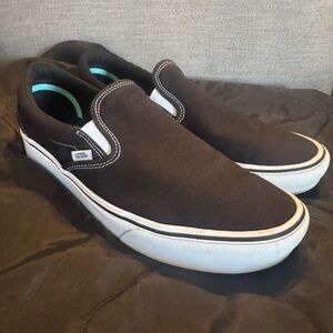 Vans Men's Black and White Slip-On Sneakers